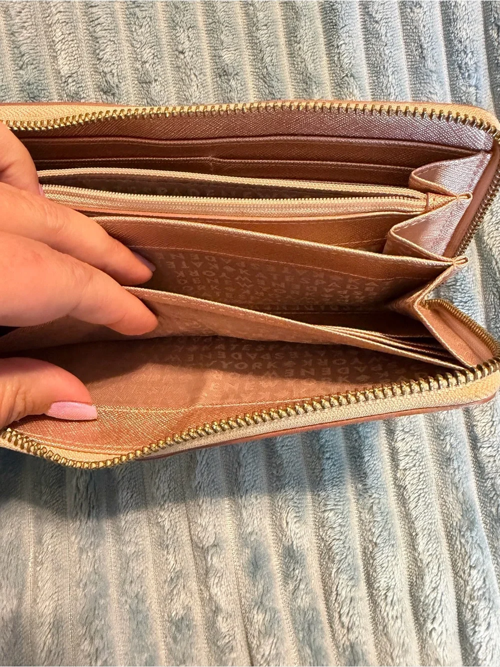 kate spade metallic rose gold zip-around wallet